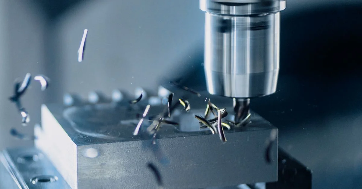 Precision milling tool machining a metal component